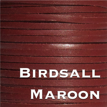 Load image into Gallery viewer, a close up of a spool of red leather