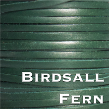 Load image into Gallery viewer, a close up of a spool of green leather