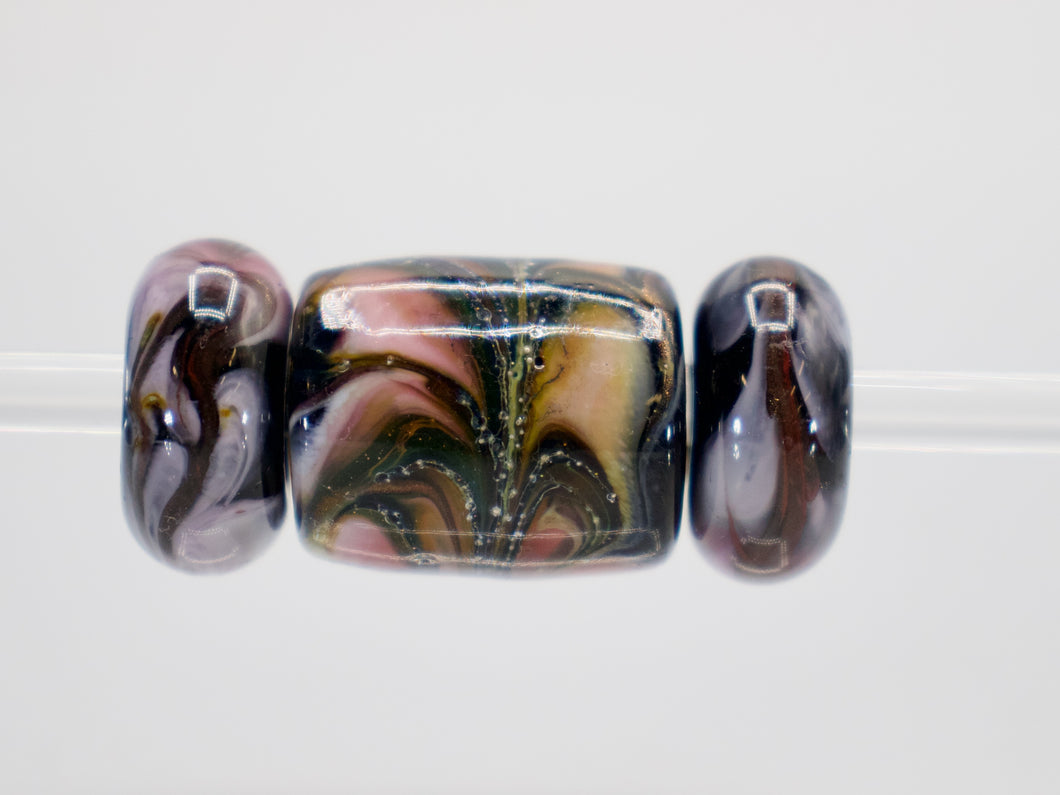 a close up of a bead made of glass beads